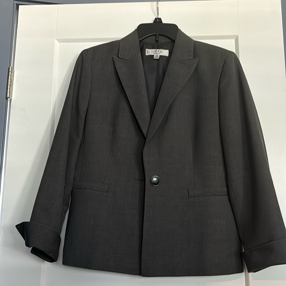 Jacket is a size 10 and pants are a size 6 Petite short.